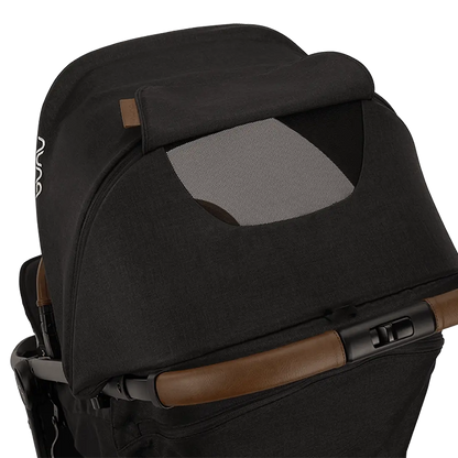 Nuna trvl™ lx - Compact travel stroller with leveled-up wheels