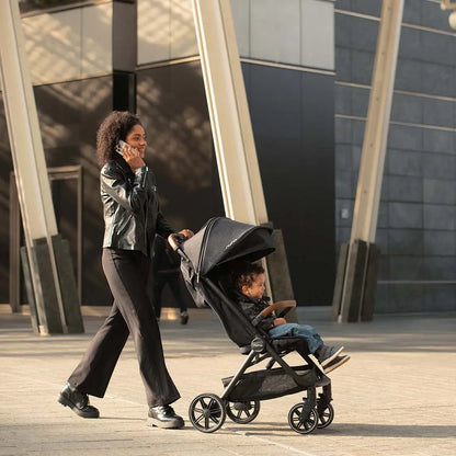 Nuna trvl™ lx - Compact travel stroller with leveled-up wheels