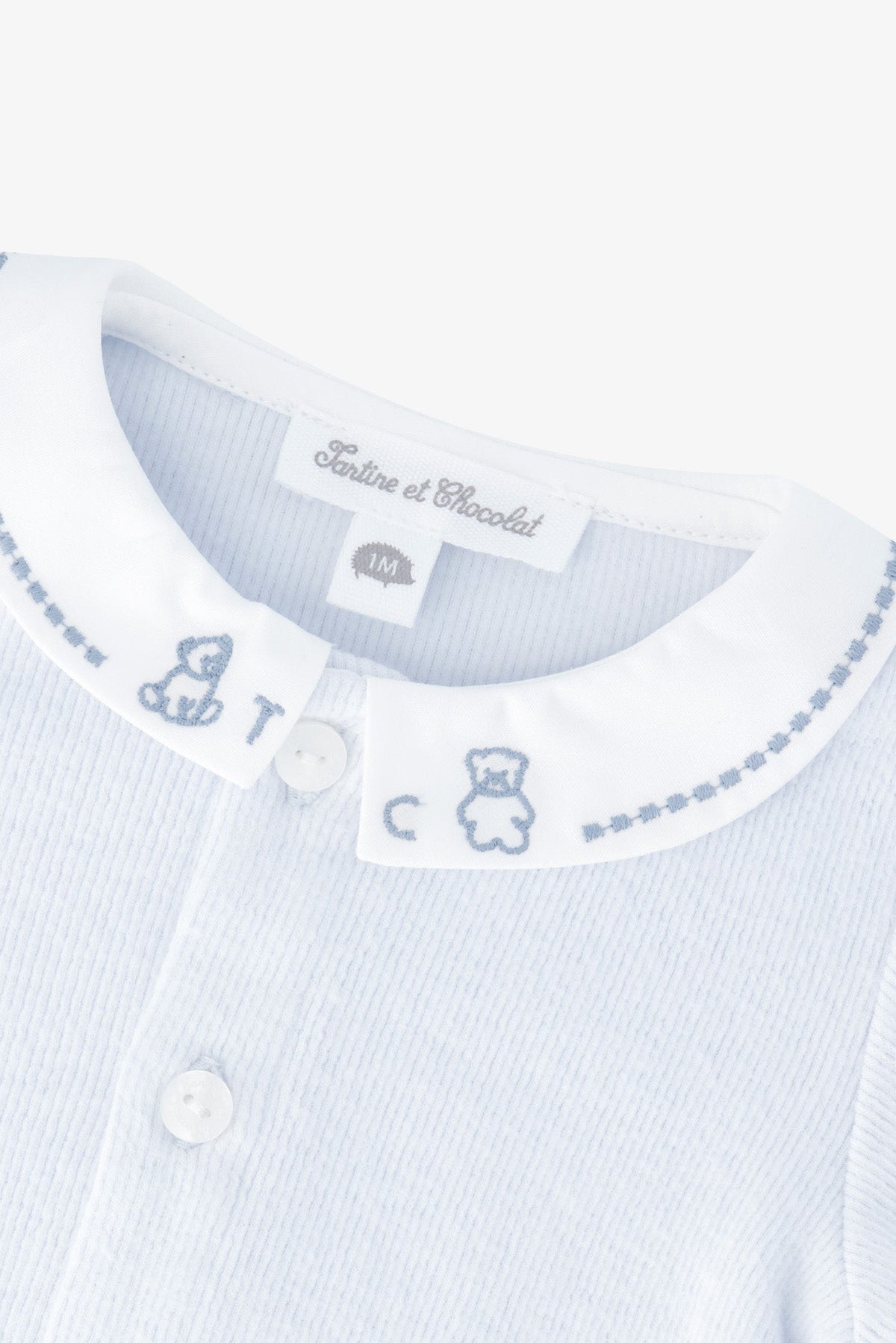 Jumpsuit long
Sky blue cotton Peter pan collar