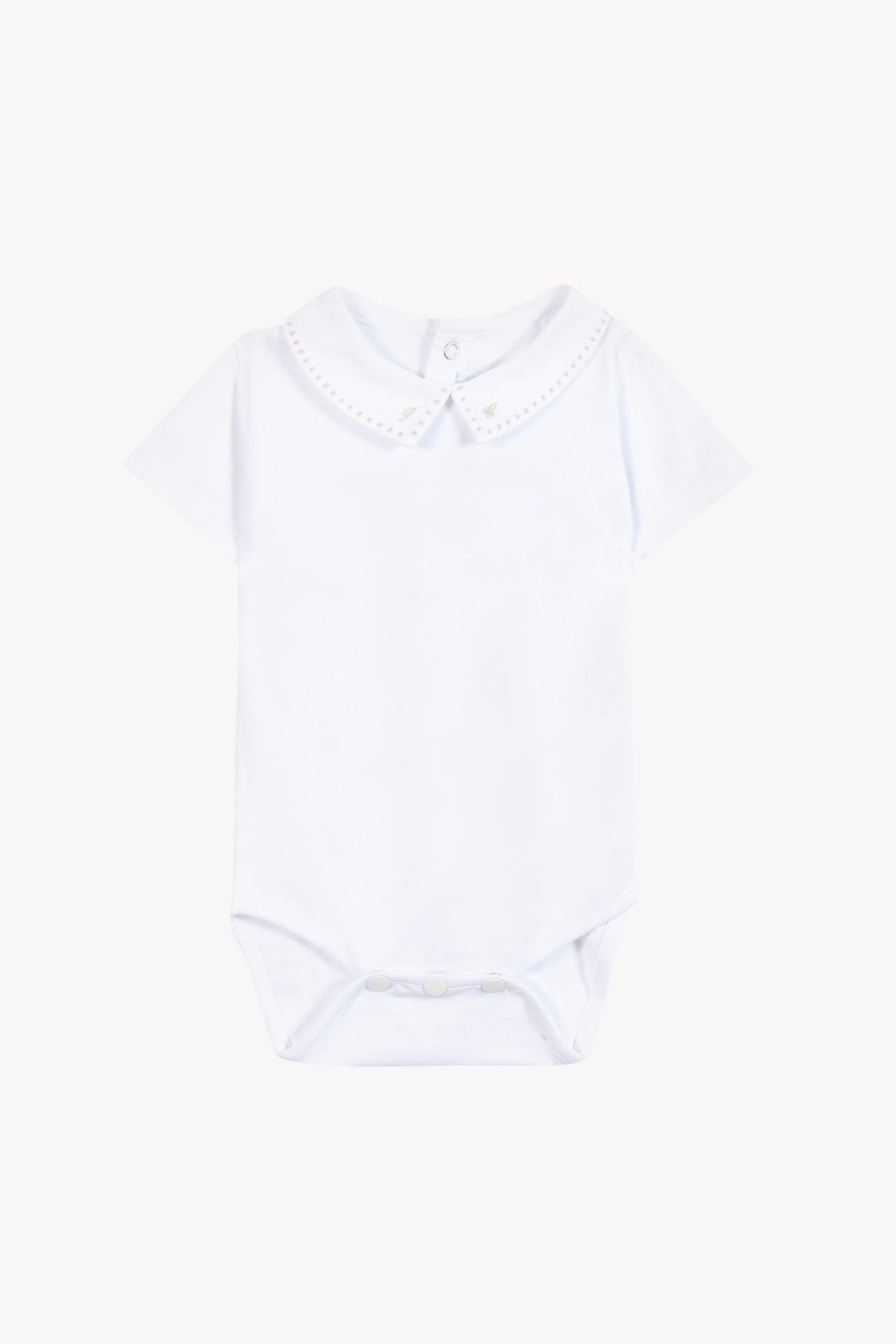 Body
White cotton Pointed collar