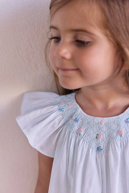 Dress
Blue smocked cotton Embrodery