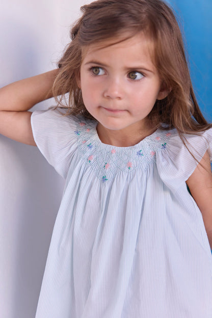 Dress
Blue smocked cotton Embrodery