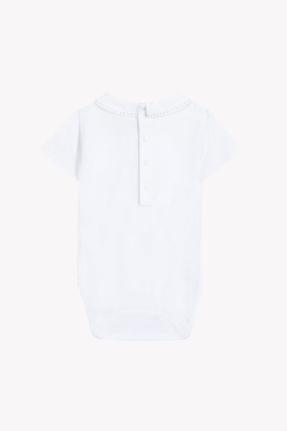 Body
White cotton Pointed collar